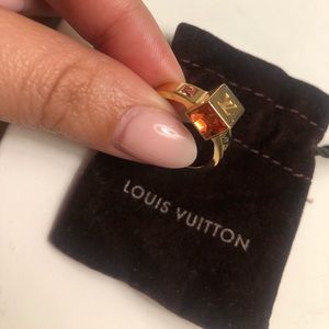 Louis Vuitton rose gold ring.